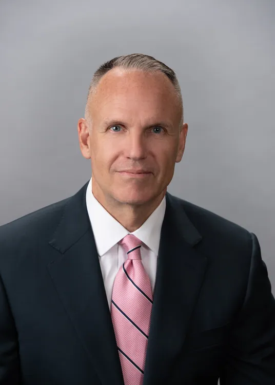 CHRISTOPHER J. EUELL