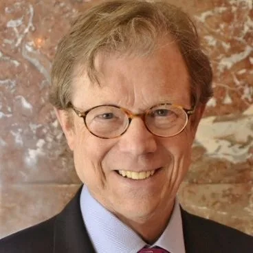 ALAN E. LAX