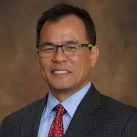 JOHN CHUNEN HUANG