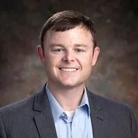 DEREK W HUGHES