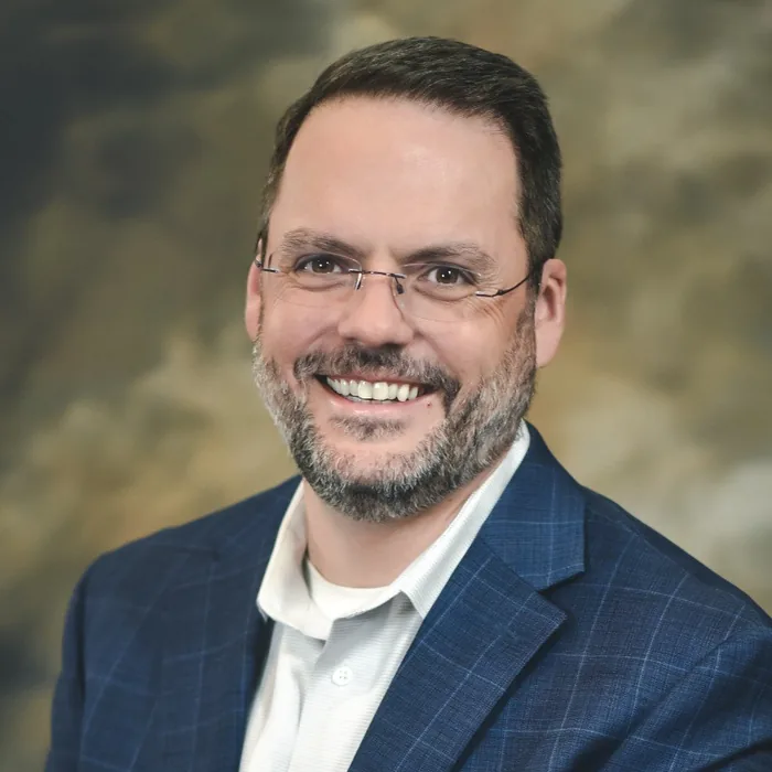 ANDREW ELLIS OSTER