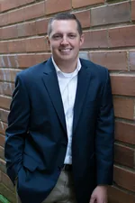 BRETT CHARLES BUSUTTIL