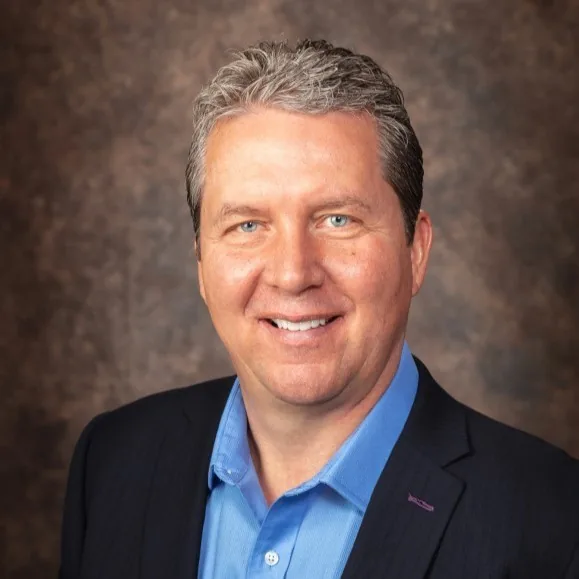 PAUL M. NORMAN
