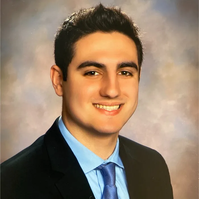 JUSTIN Taylor BRUZZESE