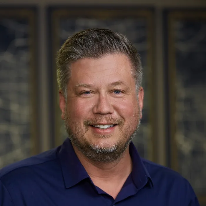 ELLIOT THOMAS OMANSON