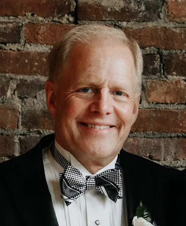 JOHN GLENN STEINKE