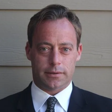 DARREN J CARIS